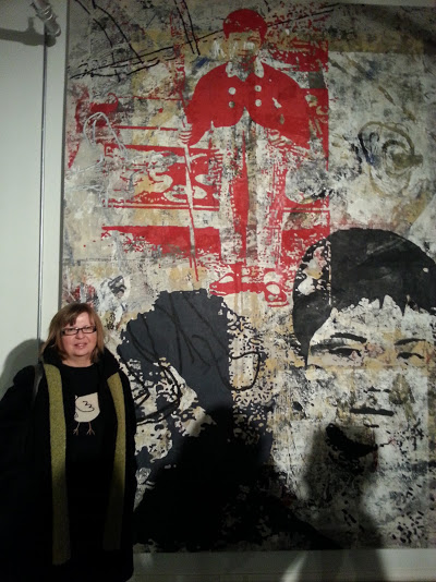 My mom in front of a huge piece in the Zhou B Art Center's main gallery