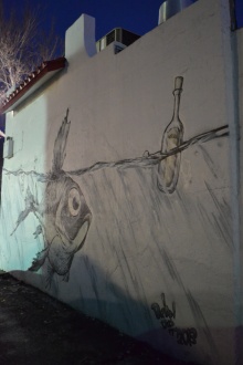 This piece lives on the side of a pizzeria on Lake Street. The bottle says Silvia.